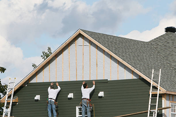 Professional Siding Installation technician working in Morrisville, NY